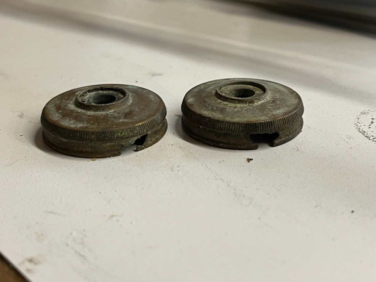 Bottom caps have same ID and threads as top caps, just plain rotten, casings and other caps are fine